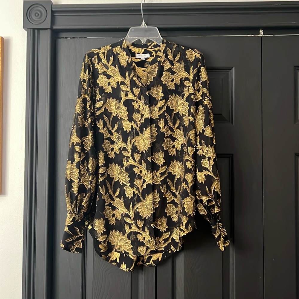 Equipment Black blouse with gold metallic florals.